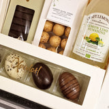 Påskekurv med dansk lemonade og chokolade
