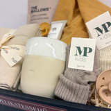 Økologisk stjerne nusseklud og bløde babystrømper fra MP Danmark – giver tryghed og stimulerer sanserne hos den lille ny.