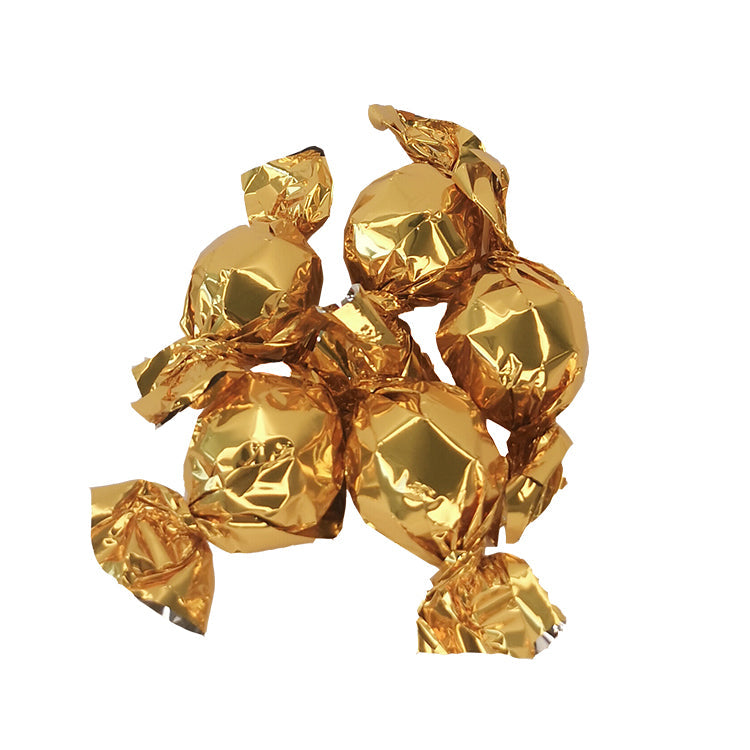 Chokoladekugler med karamelcreme. Guld chokoladekugler