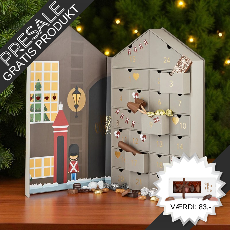 Fortryllende julehus-julekalender med 24 skuffer fyldt med chokolade, lakrids, marcipan og andre søde overraskelser – perfekt til par eller små familier.	
