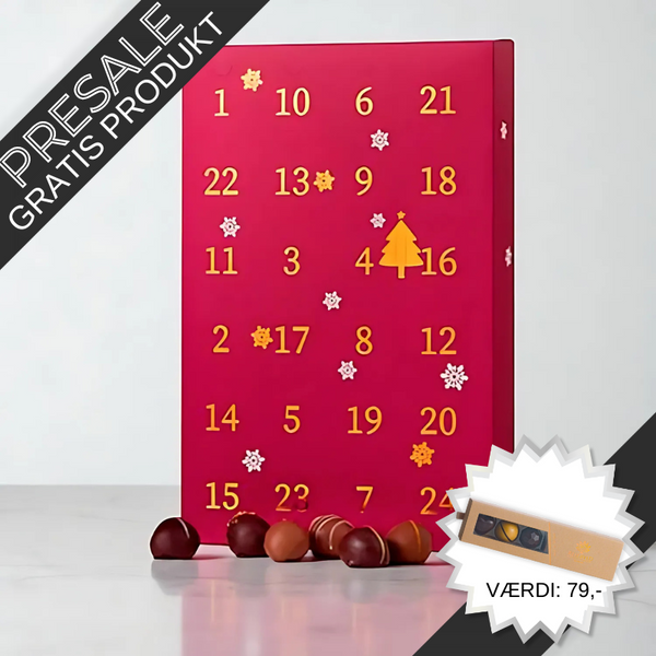 Julekalender med 24 romkugler – chokoladeovertrukne trøffelkugler med flydende karamel og 12 forskellige smagsvarianter.