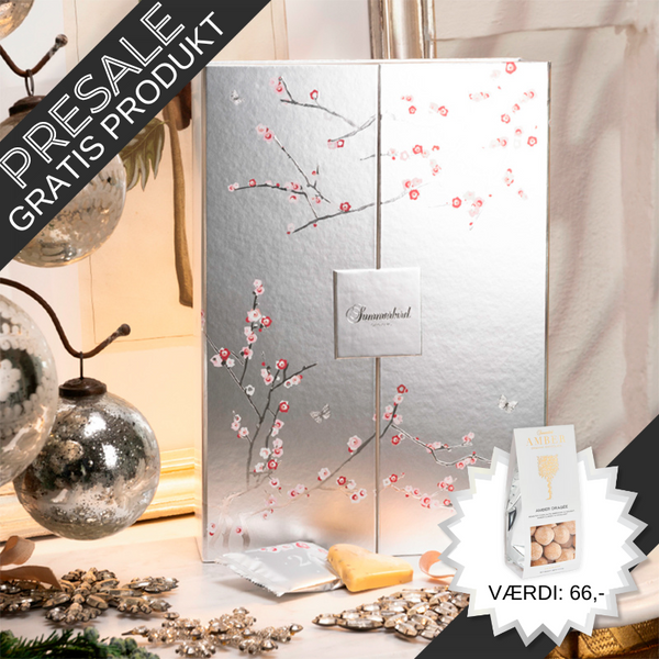Luksus julekalender med dansk, økologisk premium chokolade – perfekt til at dele eller give som gave.	