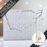 Elegant Summerbird julekalender med økologisk luksuschokolade – dansk håndværk i topklasse, sølvskinnende og sofistikeret design.	