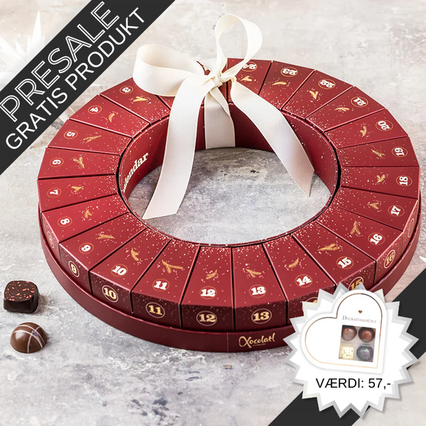 Julekrans-julekalender fra Xocolatl – 24 æsker samlet i en smuk krans, hver med to fyldte danske chokolader med bl.a. karamel, ganache og nougat.	