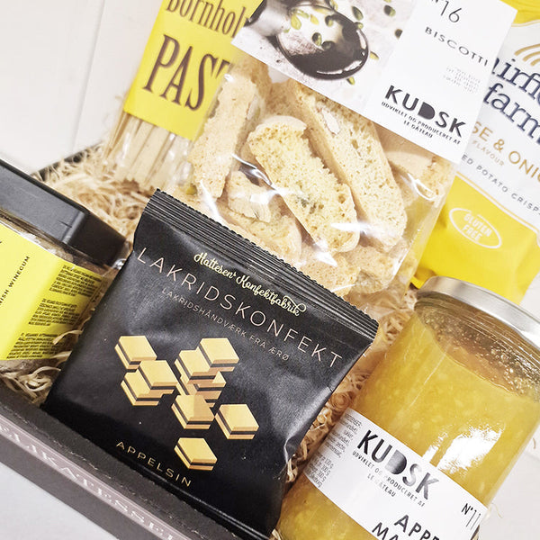 Gavekurv med solskinsgule delikatesser