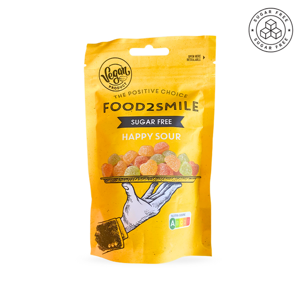 Sukkerfrie veganske vingummier formet som små hjerter med smag af appelsin, lime og æble – frisk og syrlig slik uden gluten, perfekt som sommersnack.
