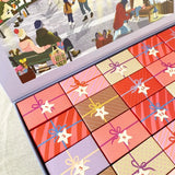 Puslespilsjulekalender med 24 nummererede æsker