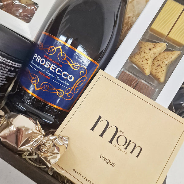 Mors dag gave med Prosecco-bobler, chokolade og lakrids