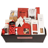 Julens smukkeste julekurv med danske lækkerier. Her er både chokolade, lakrids, karameller og småkager fra de førende danske gourmetbrands.