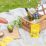 Sukkerfrie veganske vingummier formet som små hjerter med smag af appelsin, lime og æble – frisk og syrlig slik uden gluten, perfekt som sommersnack.