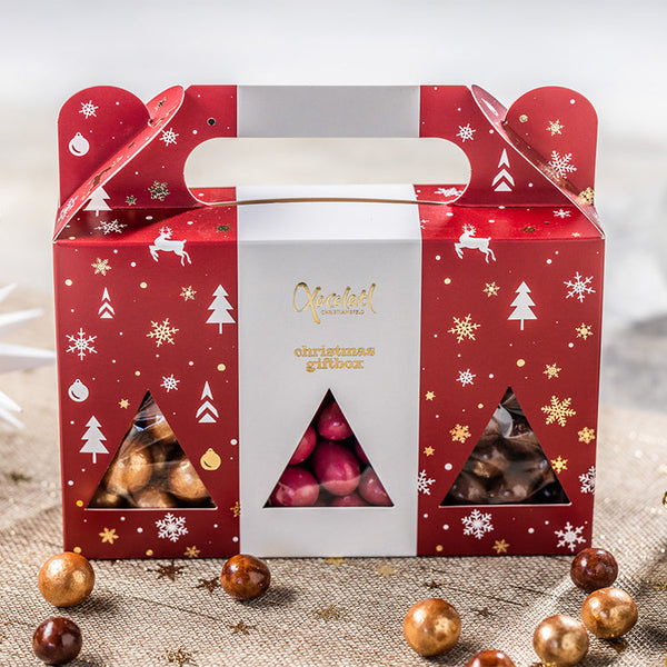 Julerød gaveæske med tre slags lækkerier fra Xocolatl
